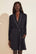 Fatou is 5'10" and wears a Small