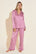 Joanna is 5'7" and wears a Small