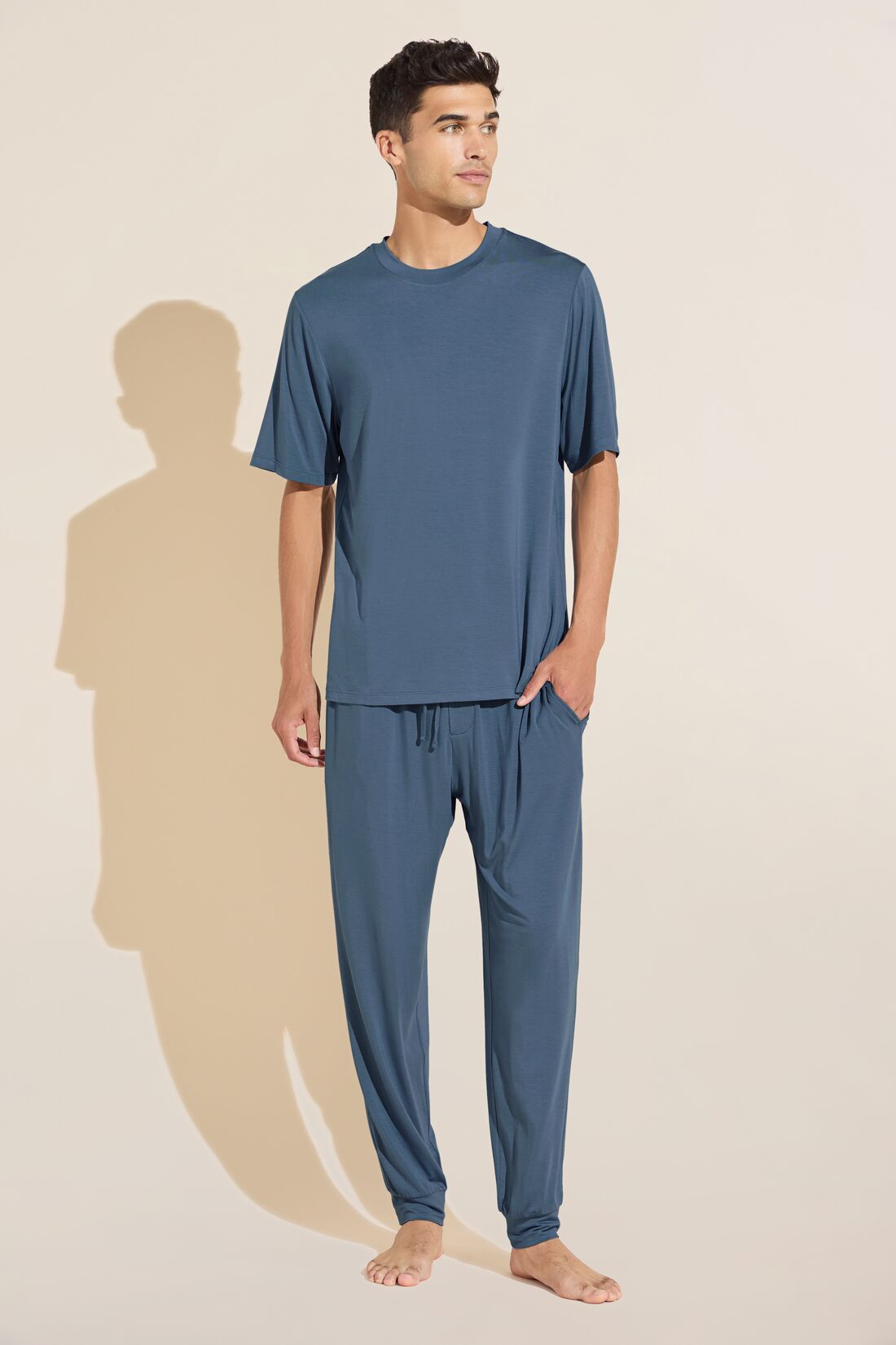 Laurence is 6'2" and wears a Large