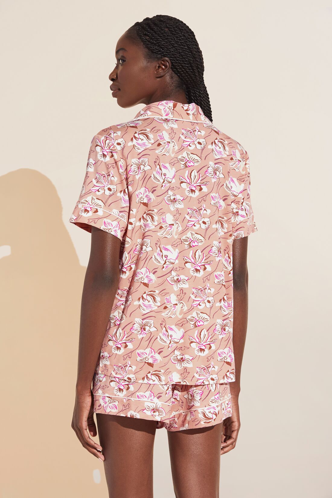 Fatou is 5'10" and wears a Small
