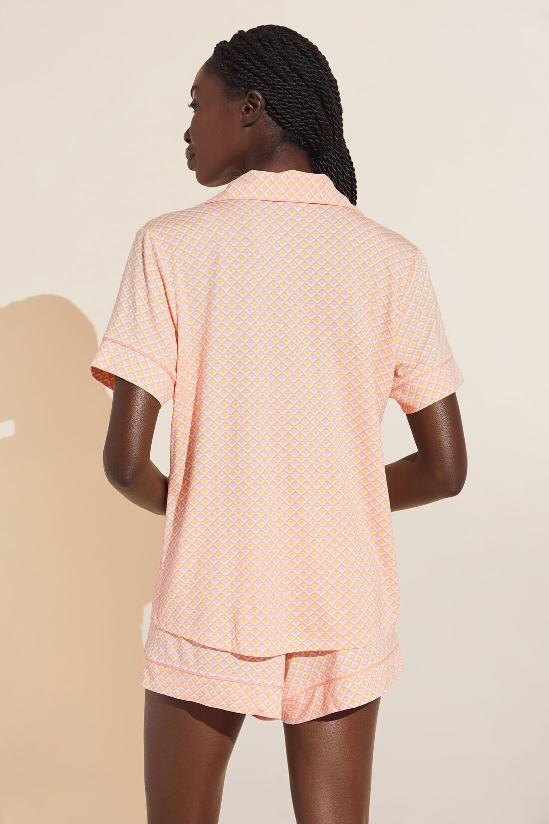 Fatou is 5'10" and wears a Small.
