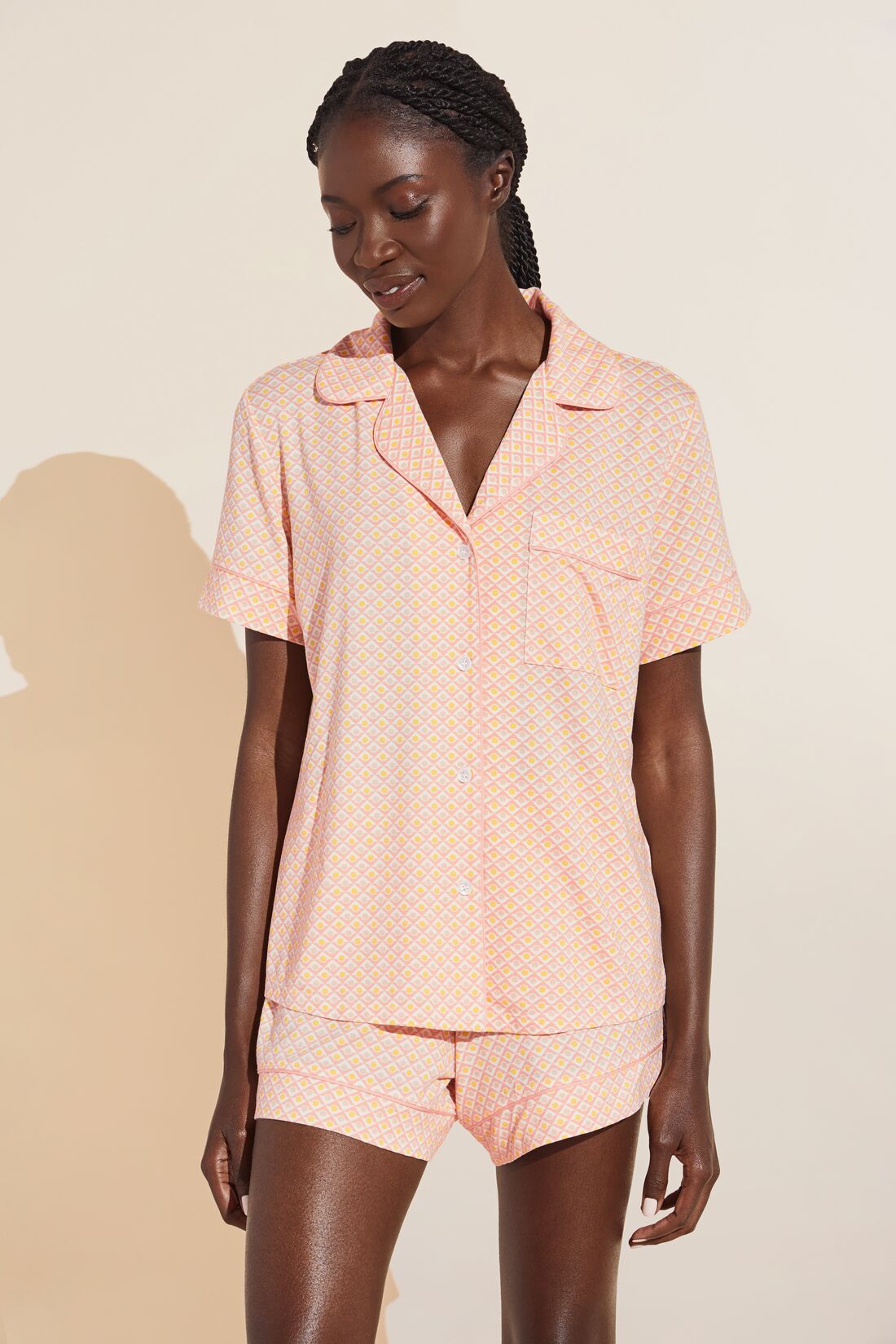 Fatou is 5'10" and wears a Small.