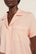 Fatou is 5'10" and wears a Small.
