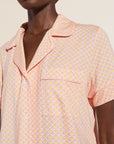 Fatou is 5'10" and wears a Small.